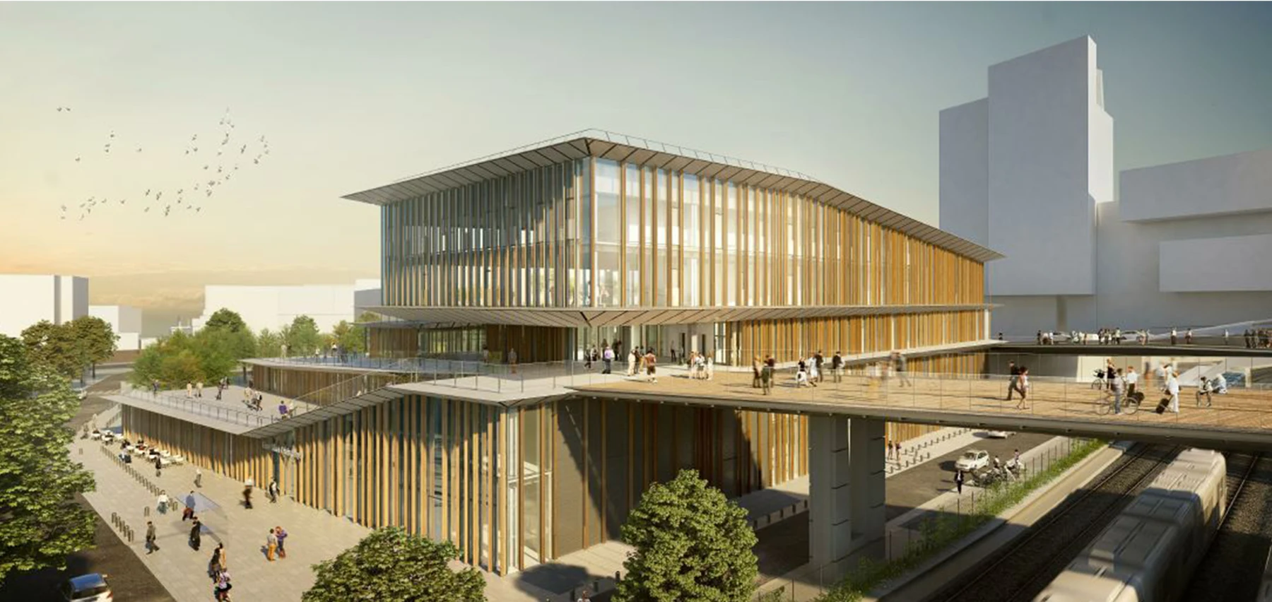 Timber and glass transport building within an urban context